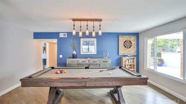 a kitchen with sink and cabinets