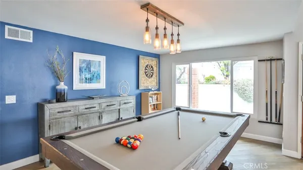 a kitchen with stainless steel appliances granite countertop a stove and a refrigerator