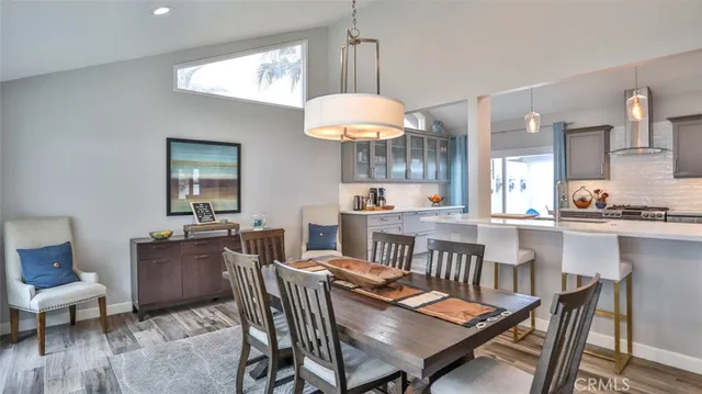 a kitchen with sink and cabinets