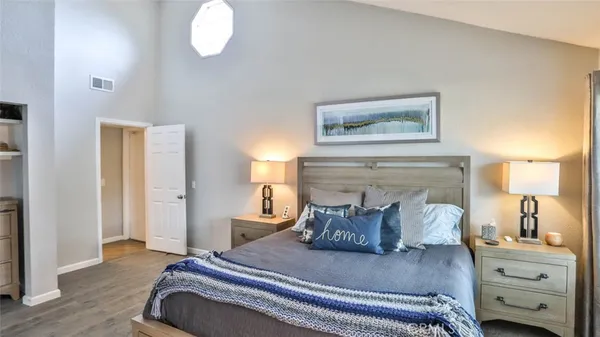 a view of a patio with a table and chairs