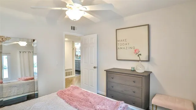 a kitchen with a refrigerator and a sink