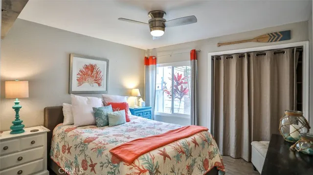 a bathroom with a granite countertop shower a mirror and a sink