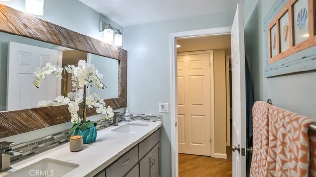 a view of a patio with a table and chairs