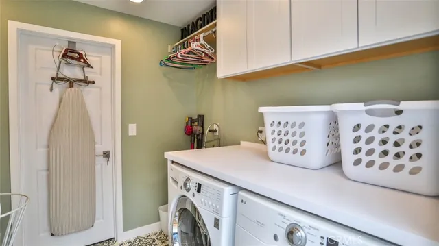 an aerial view of multiple houses with yard