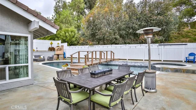 an aerial view of a house with a lot of space swimming pool and outdoor space