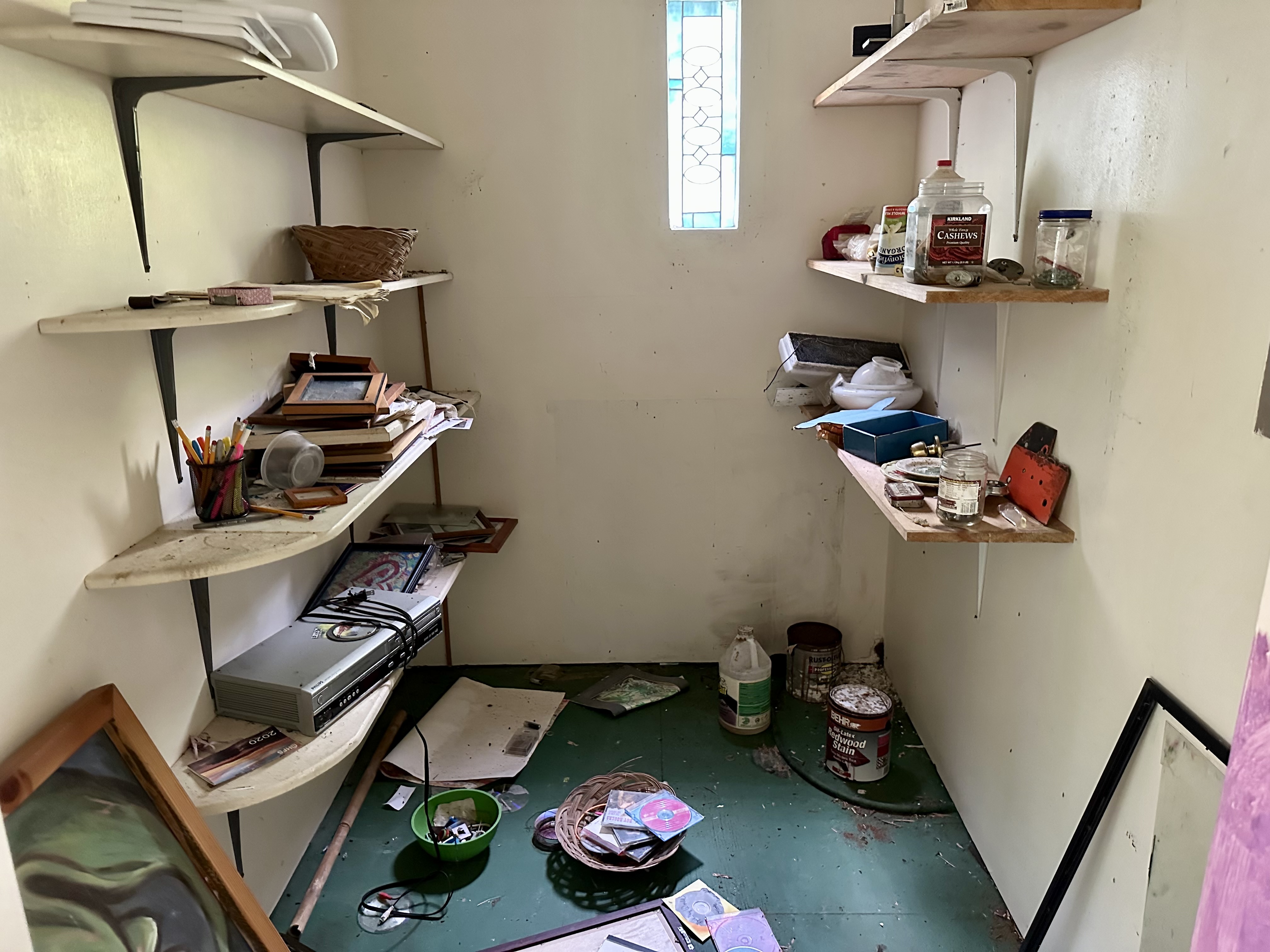 15-1105 Ama U Road Keaau, HI 96749 - Photo 11 of 29 a room with a wooden floor and shoes