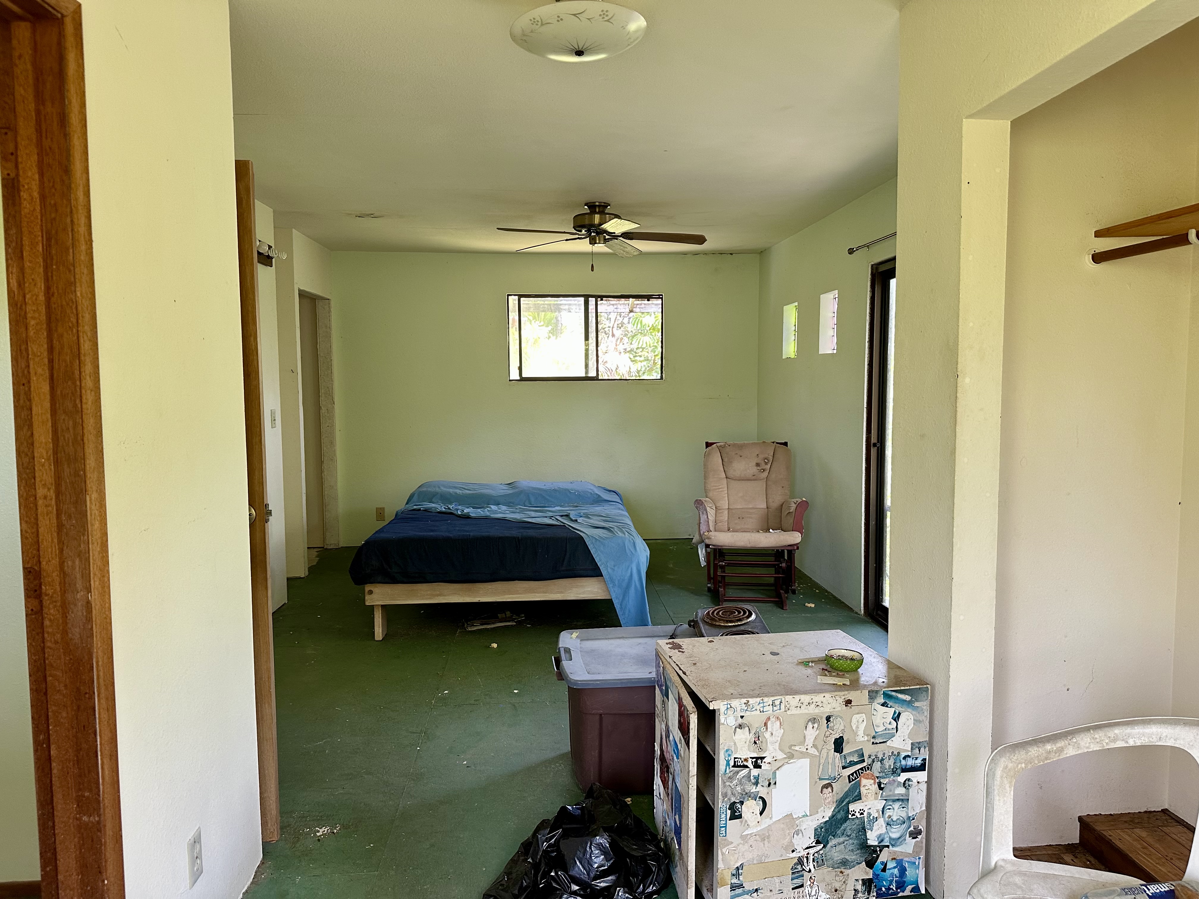 15-1105 Ama U Road Keaau, HI 96749 - Photo 17 of 29 a bedroom with a bed and a window