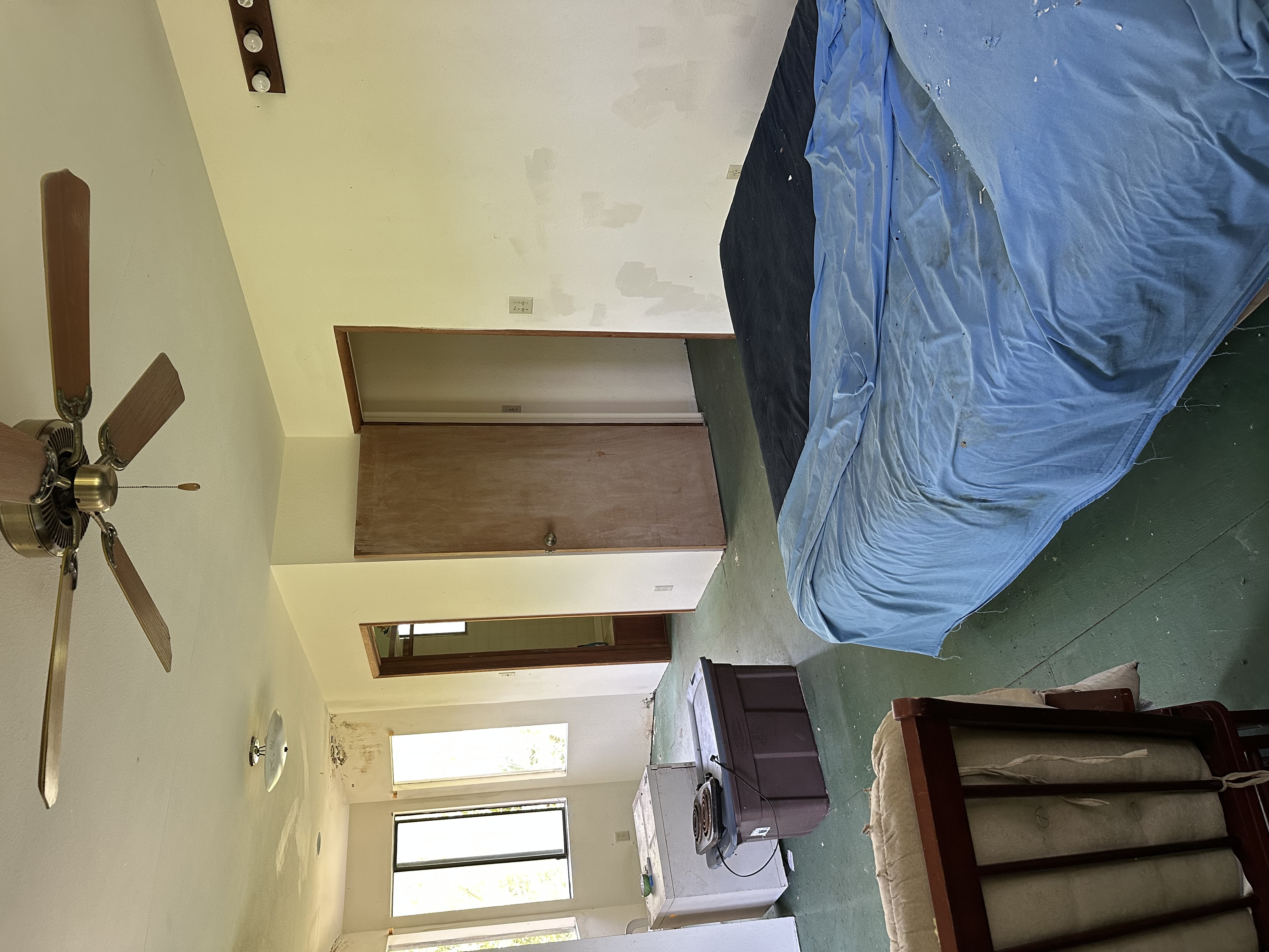 15-1105 Ama U Road Keaau, HI 96749 - Photo 18 of 29 a bedroom with a bed and wooden floor