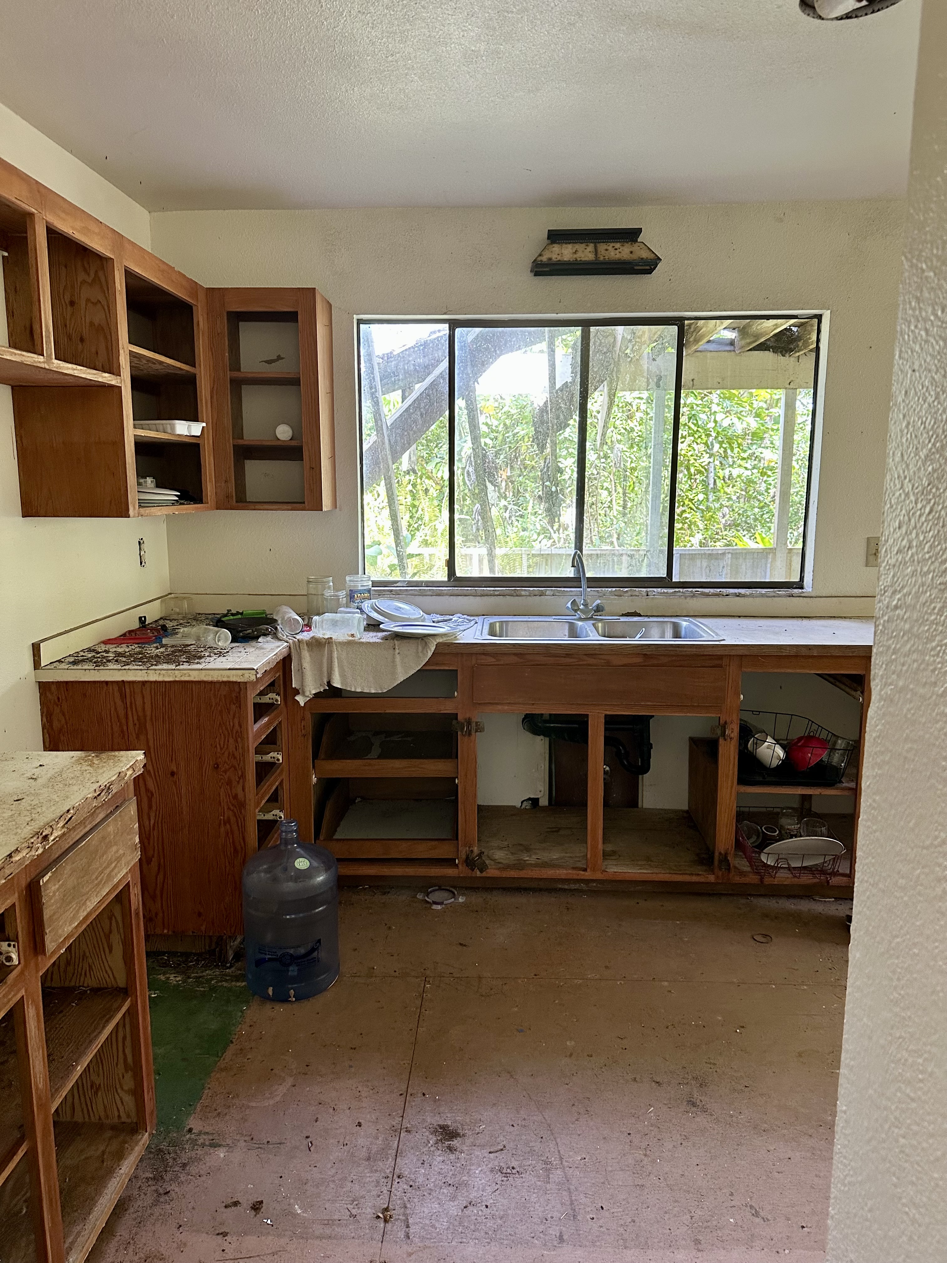 15-1105 Ama U Road Keaau, HI 96749 - Photo 4 of 29 a room with a storage and utility