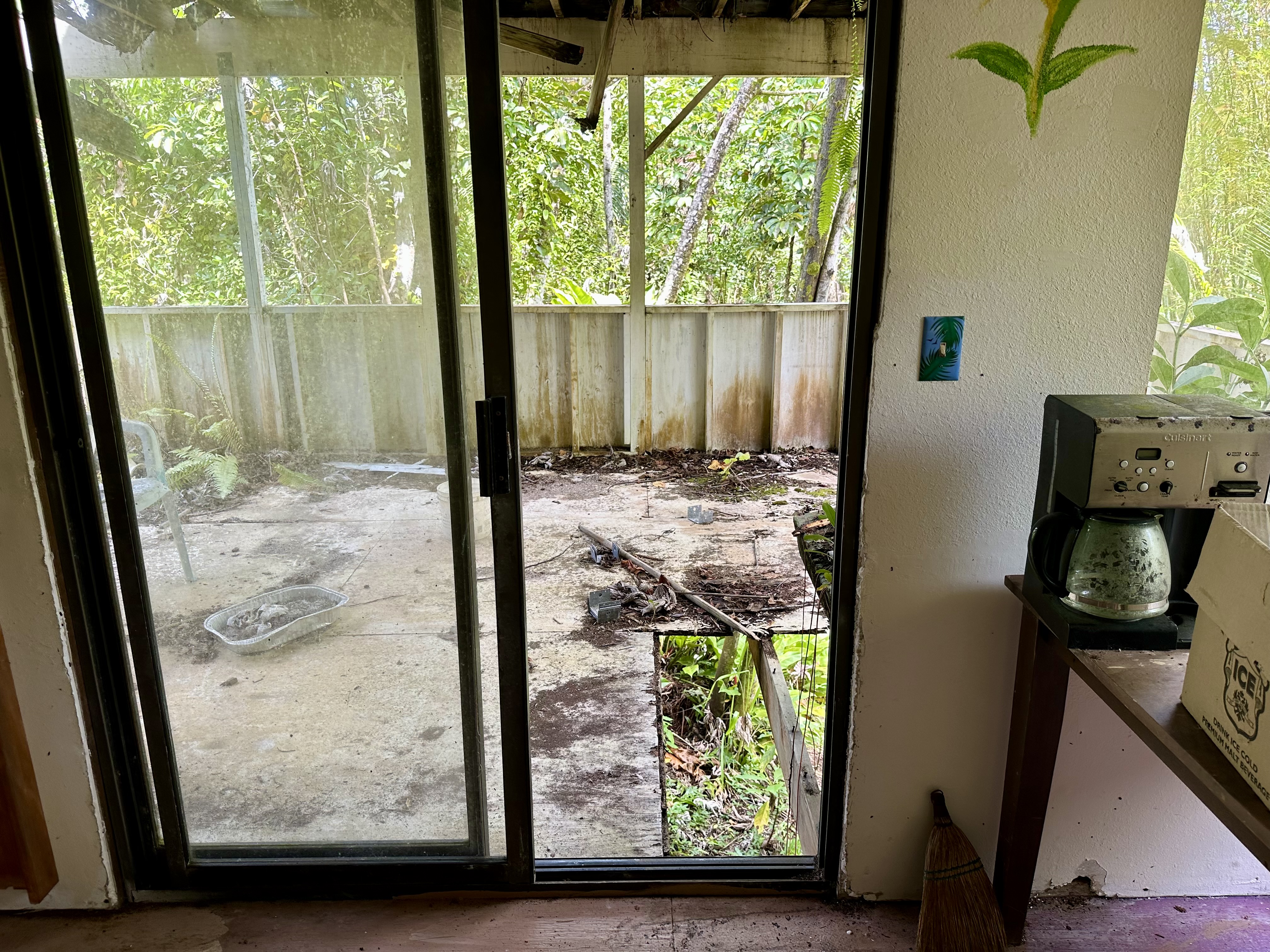 15-1105 Ama U Road Keaau, HI 96749 - Photo 7 of 29 a view of a porch with a floor to ceiling window