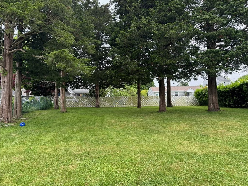 46 Salt Pond Way Westerly, RI 02891 - Photo 4 of 26 Partial view of backyard which is fenced in.