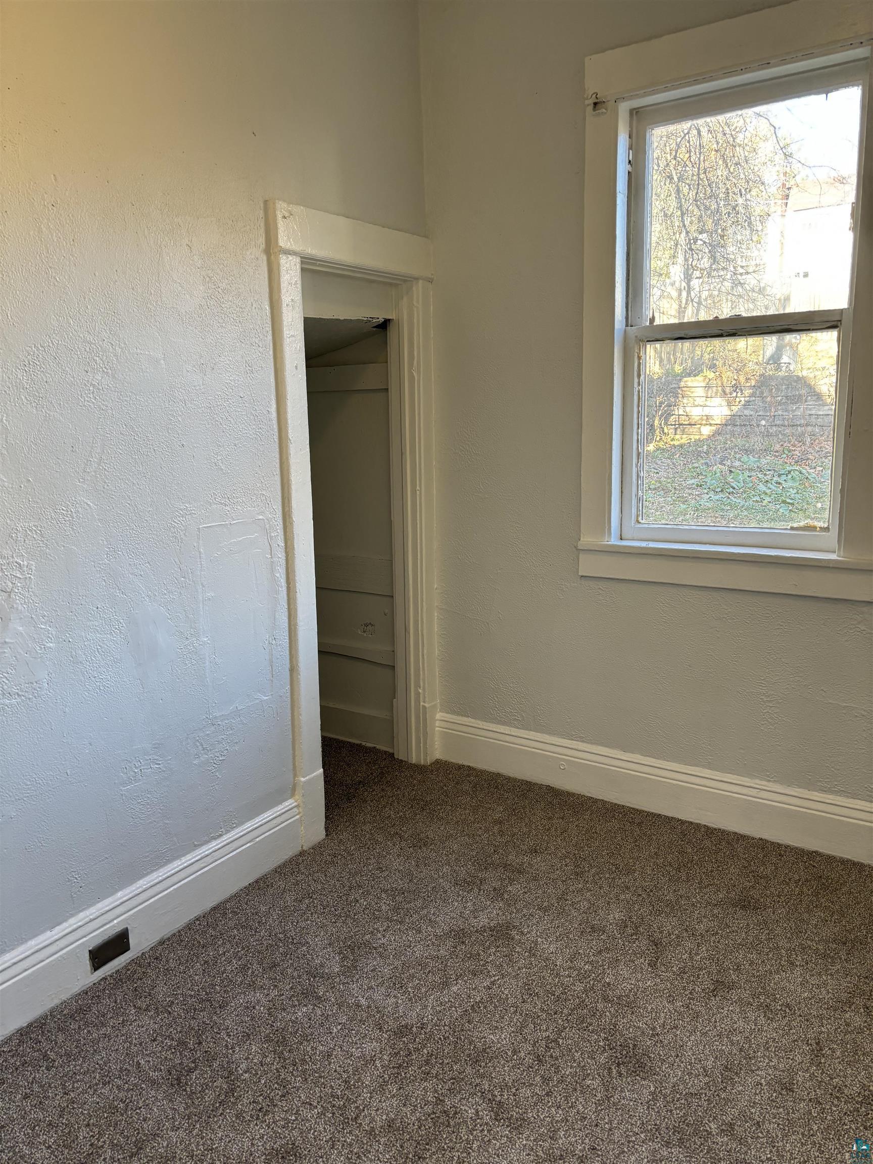 2967 Exeter Street Duluth, MN 55806 - Photo 13 of 31 Unfurnished bedroom featuring carpet floors