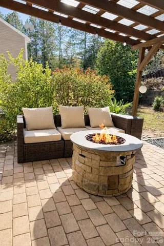 a outdoor living space with furniture and garden view