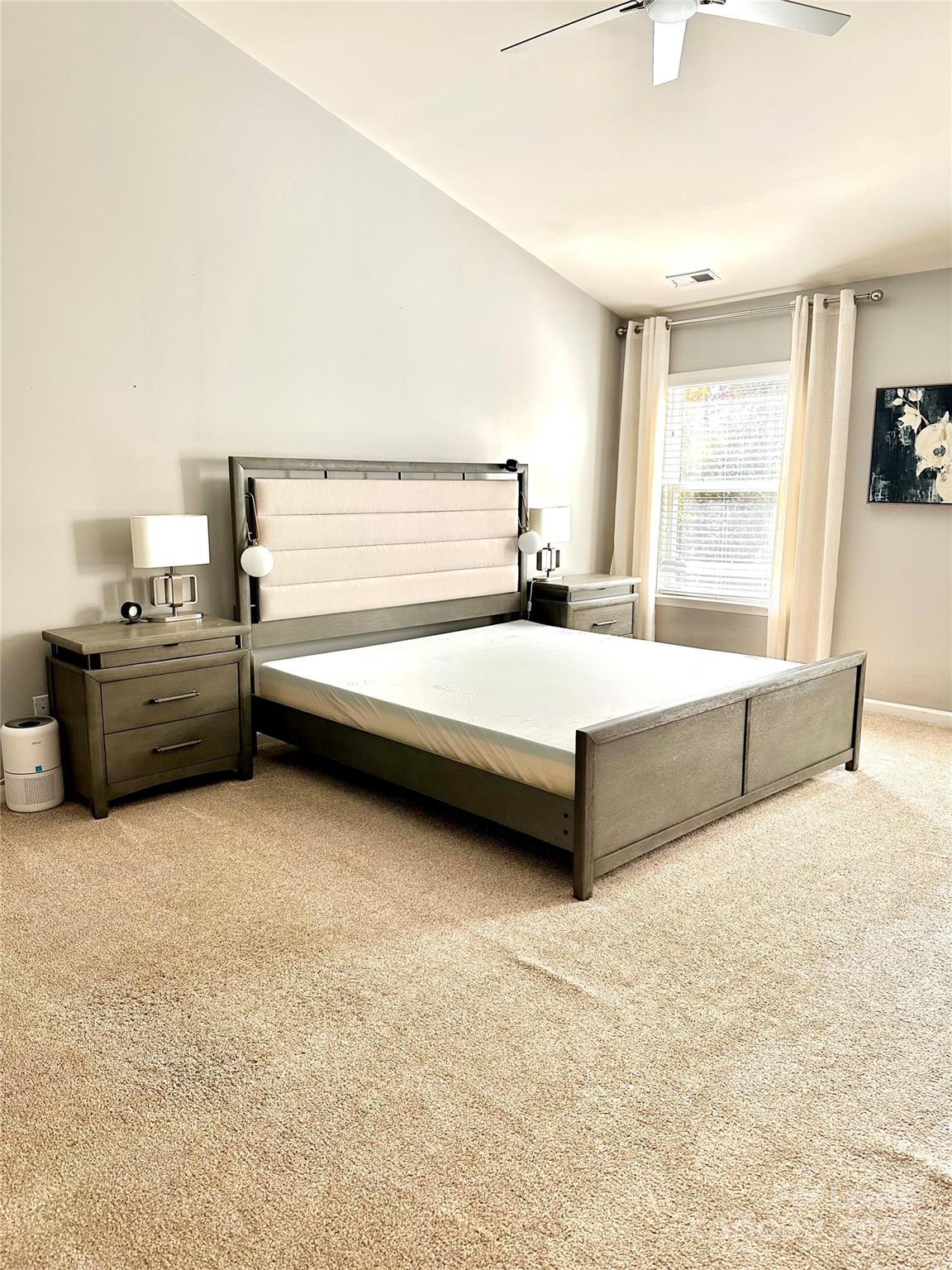 16732 Prairie Falcon Lane Charlotte, NC 28278 - Photo 7 of 18 a bedroom with a bed and window