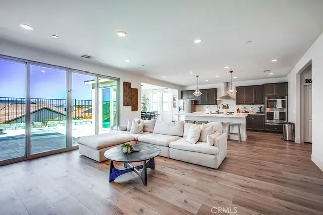 a living room with furniture and a table