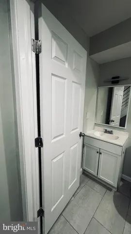 a view of a hallway with washer and dryer