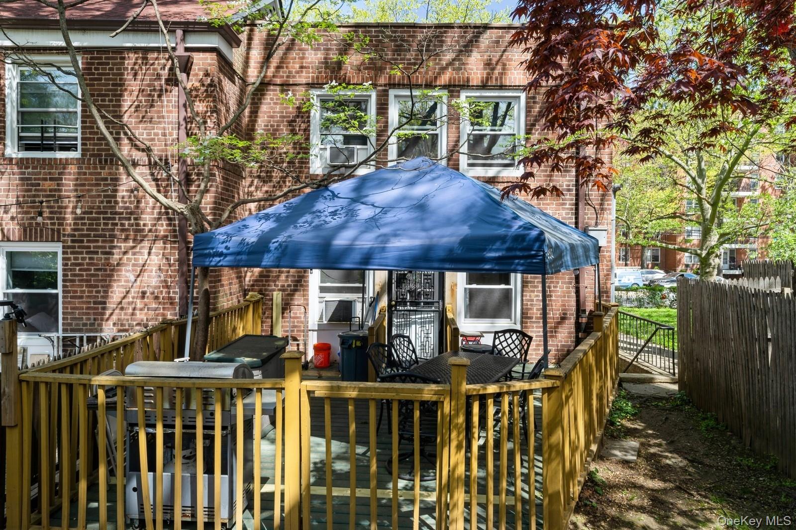 149-32 Union Turnpike, Unit 24A Queens, NY 11367 - Photo 14 of 18 a view of a chairs and table in the patio
