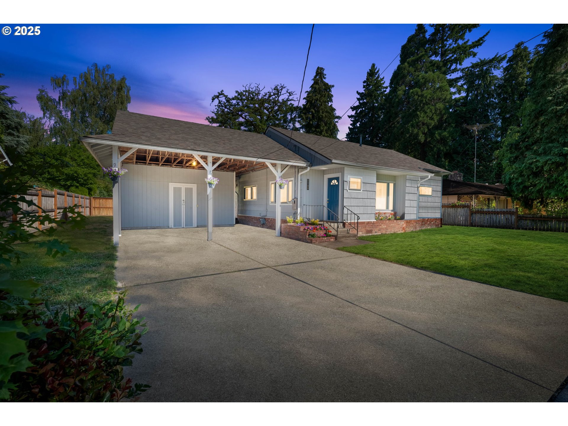 1149 Northwest 10th Street Corvallis, OR 97330 - Photo 1 of 29 a front view of a house with a yard and potted plants