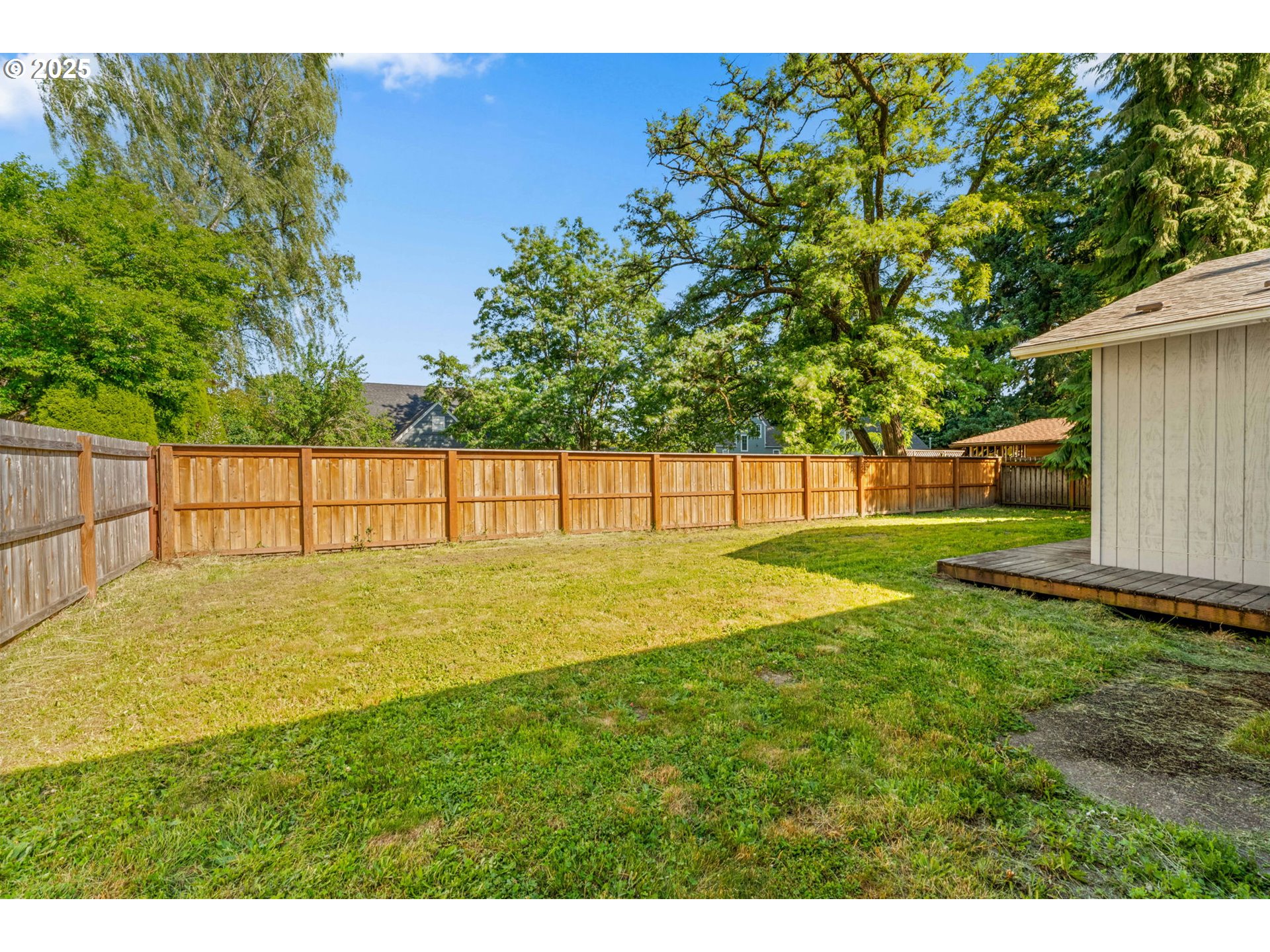 1149 Northwest 10th Street Corvallis, OR 97330 - Photo 26 of 29 a view of yard with deck and backyard