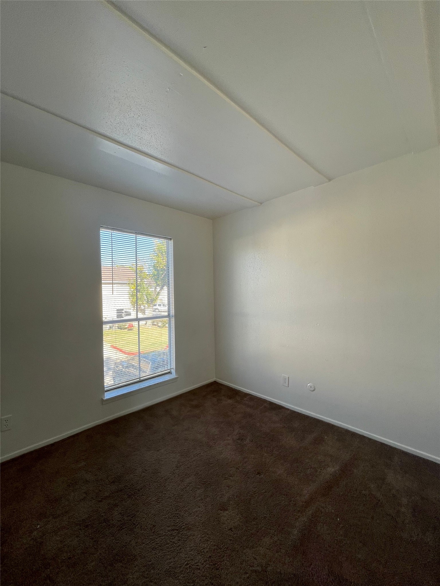 6200 West Tidwell Road, Unit 2102 Houston, TX 77092 - Photo 10 of 14 an empty room with a window