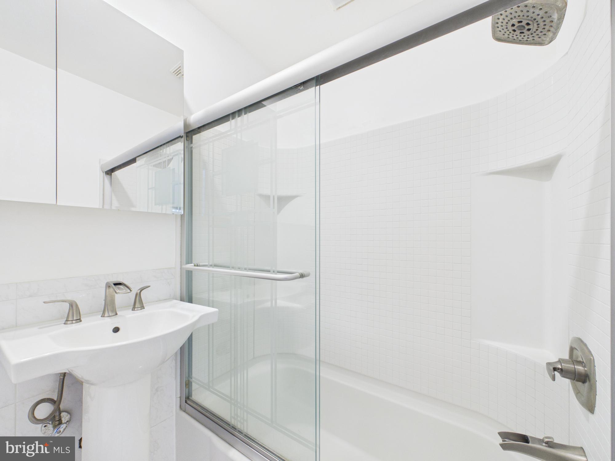 5512 Kathleen Place Springfield, VA 22151 - Photo 31 of 42 Sleek and modern bathroom oasis.