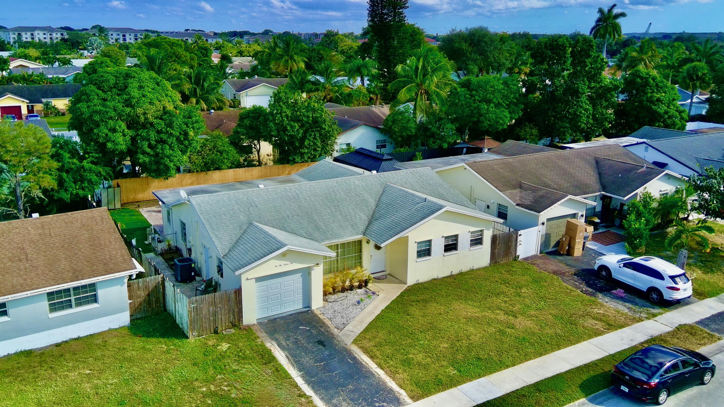 22710 Family Circle Boca Raton, FL 33428 - Photo 2 of 28 an aerial view of a house
