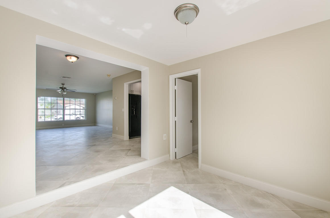 22710 Family Circle Boca Raton, FL 33428 - Photo 24 of 28 an empty room with windows and closet