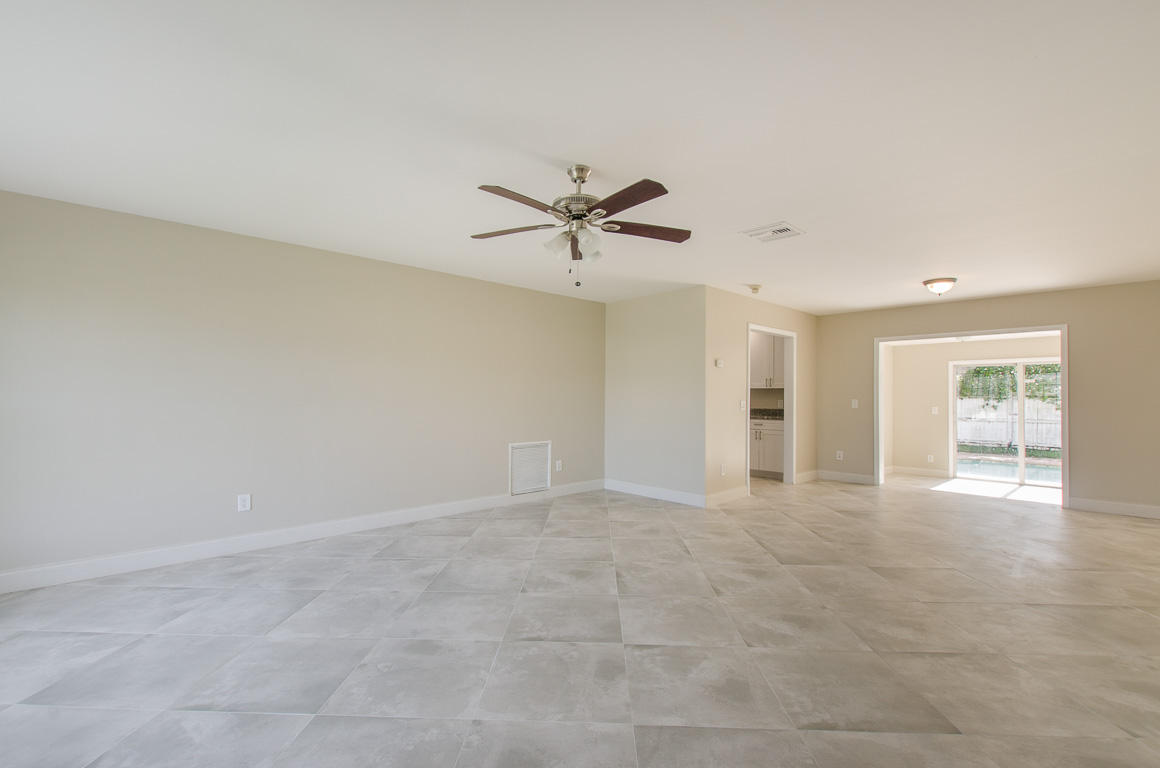 22710 Family Circle Boca Raton, FL 33428 - Photo 7 of 28 an empty room with fan and ceiling fan
