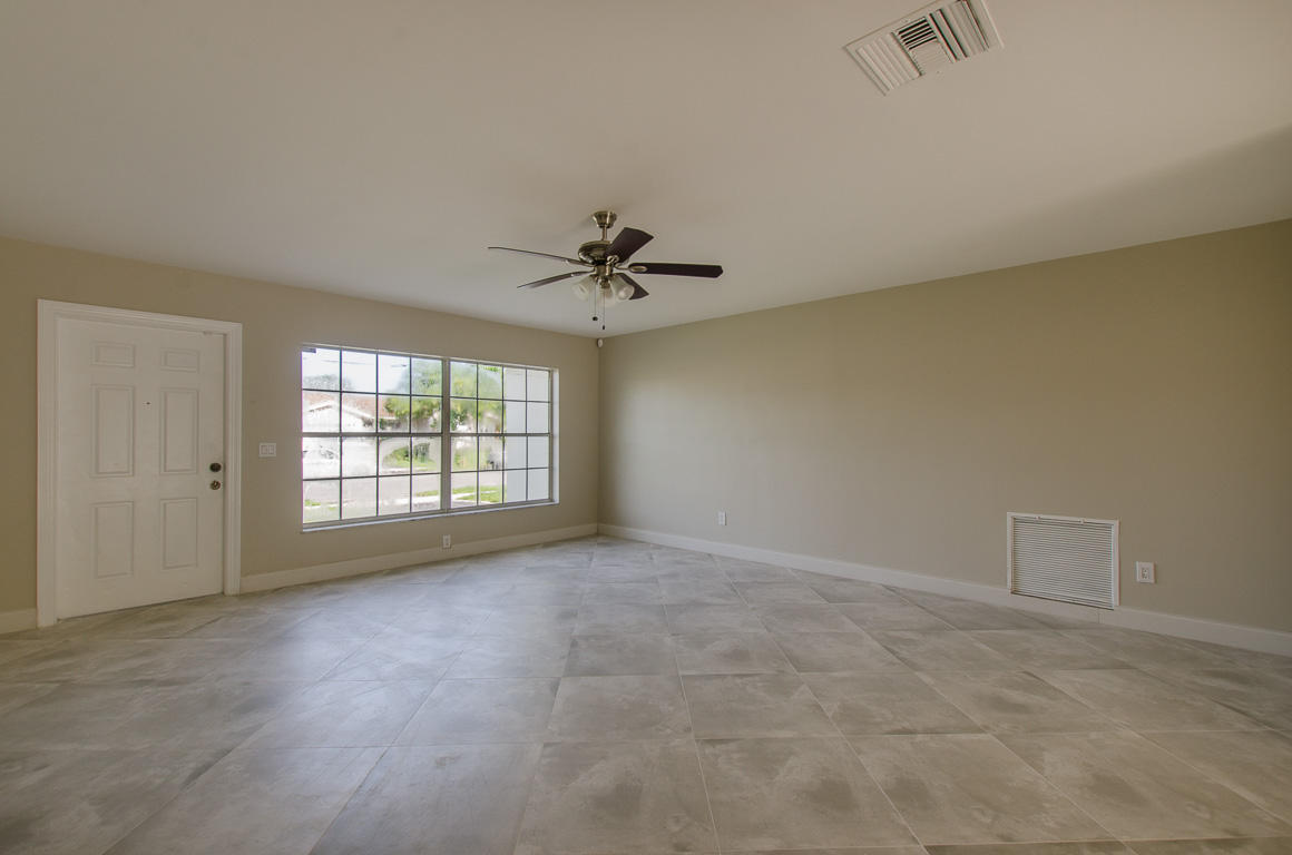 22710 Family Circle Boca Raton, FL 33428 - Photo 10 of 28 a view of an empty room with a window