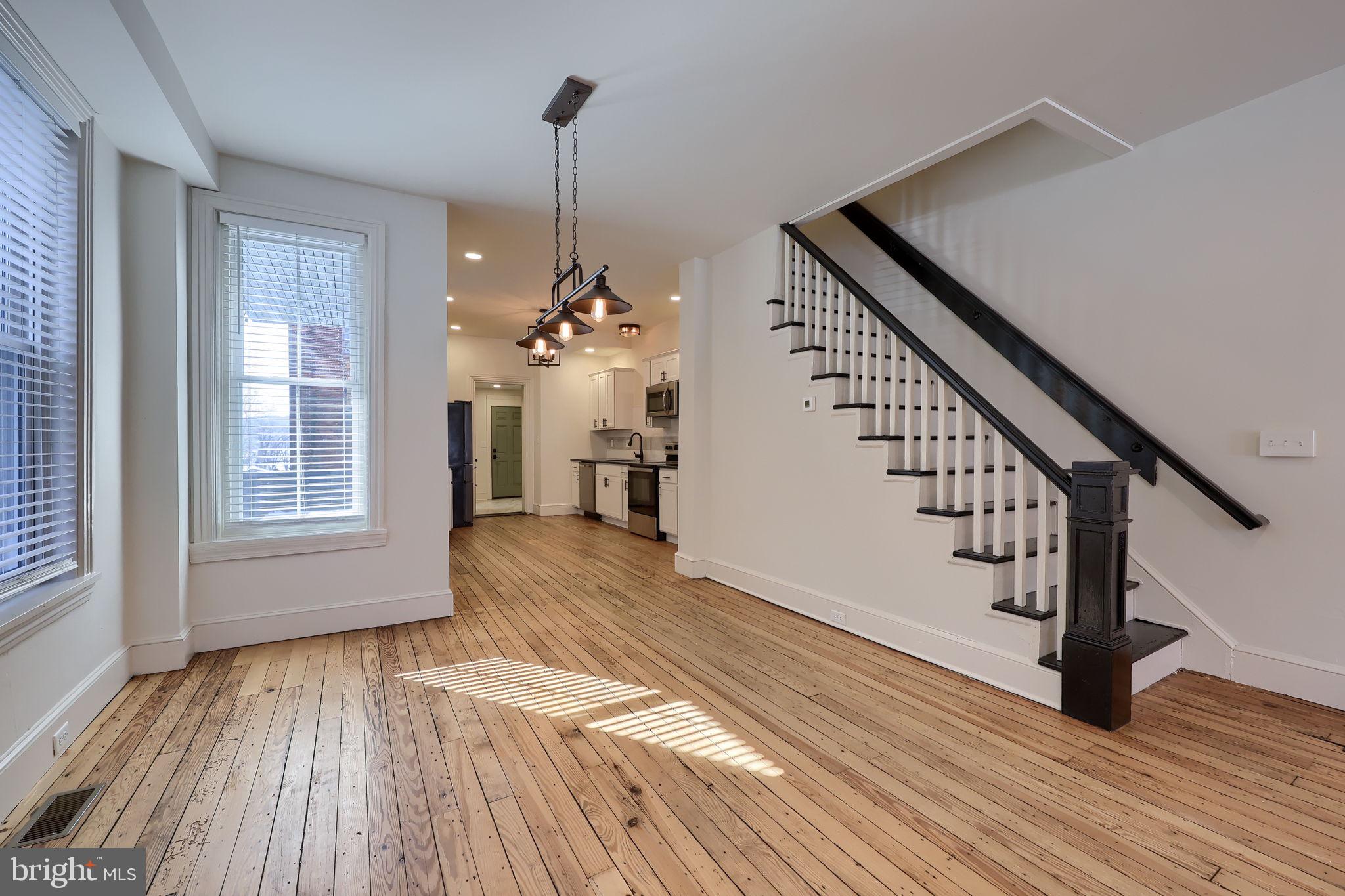 134 South 2nd Street Columbia, PA 17512 - Photo 12 of 47 a view of an entryway with wooden floor and livingroom view