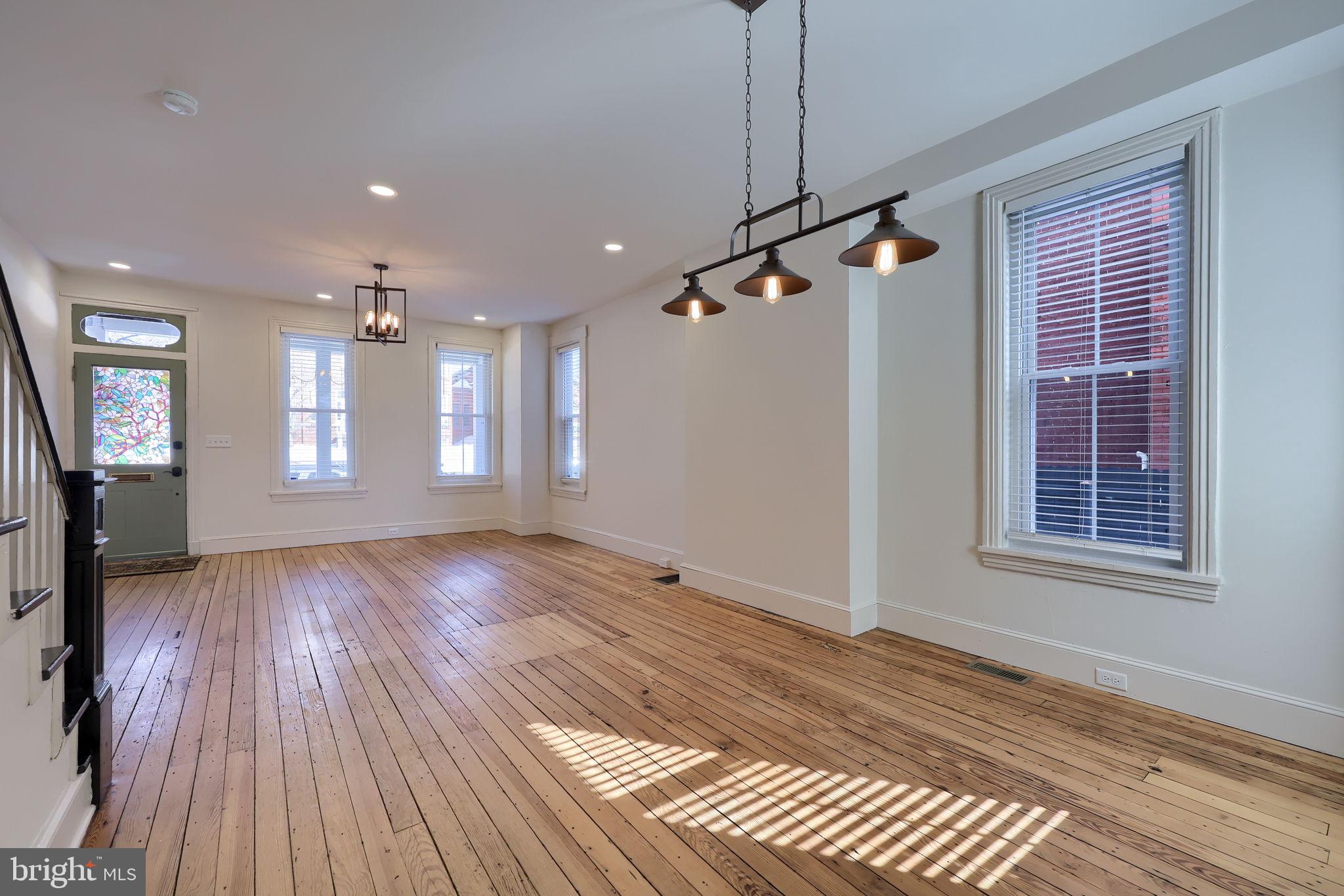 134 South 2nd Street Columbia, PA 17512 - Photo 13 of 47 a view of an empty room with wooden floor and a window
