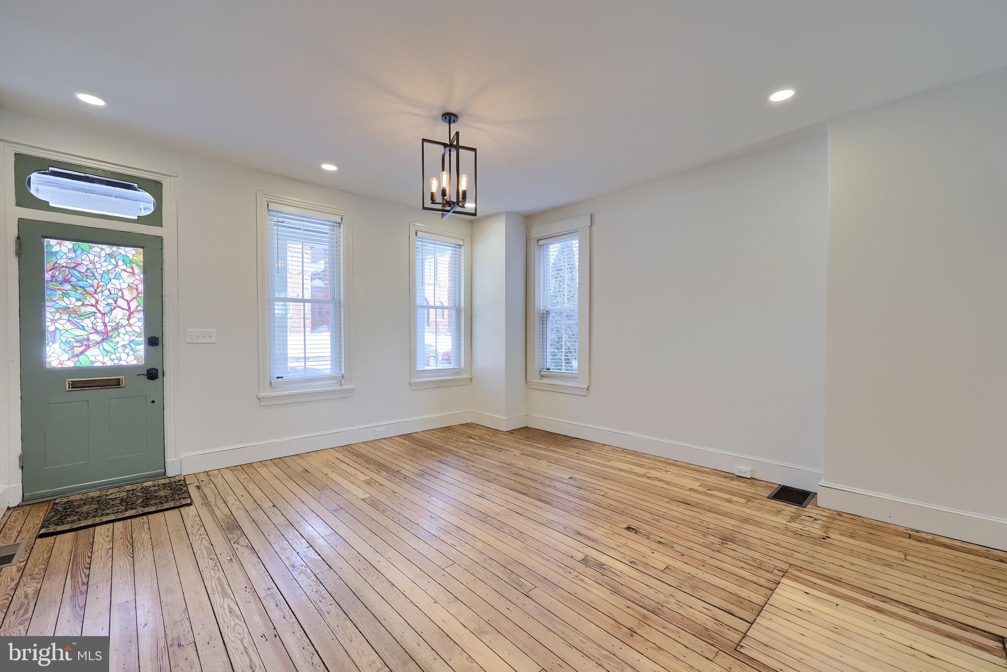 134 South 2nd Street Columbia, PA 17512 - Photo 15 of 47 a view of empty room with wooden floor and window
