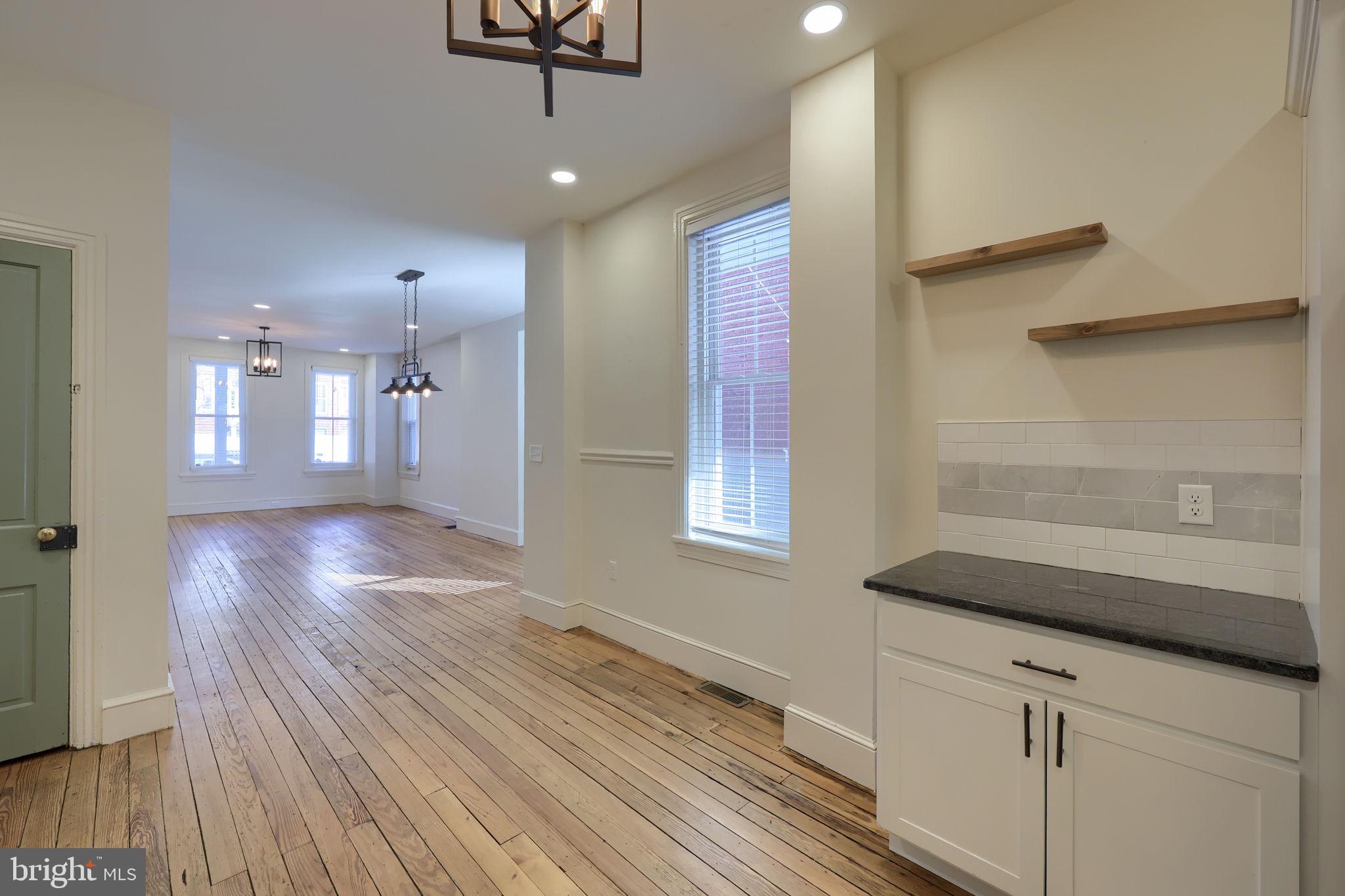 134 South 2nd Street Columbia, PA 17512 - Photo 17 of 47 a view of a room with wooden floor and staircase