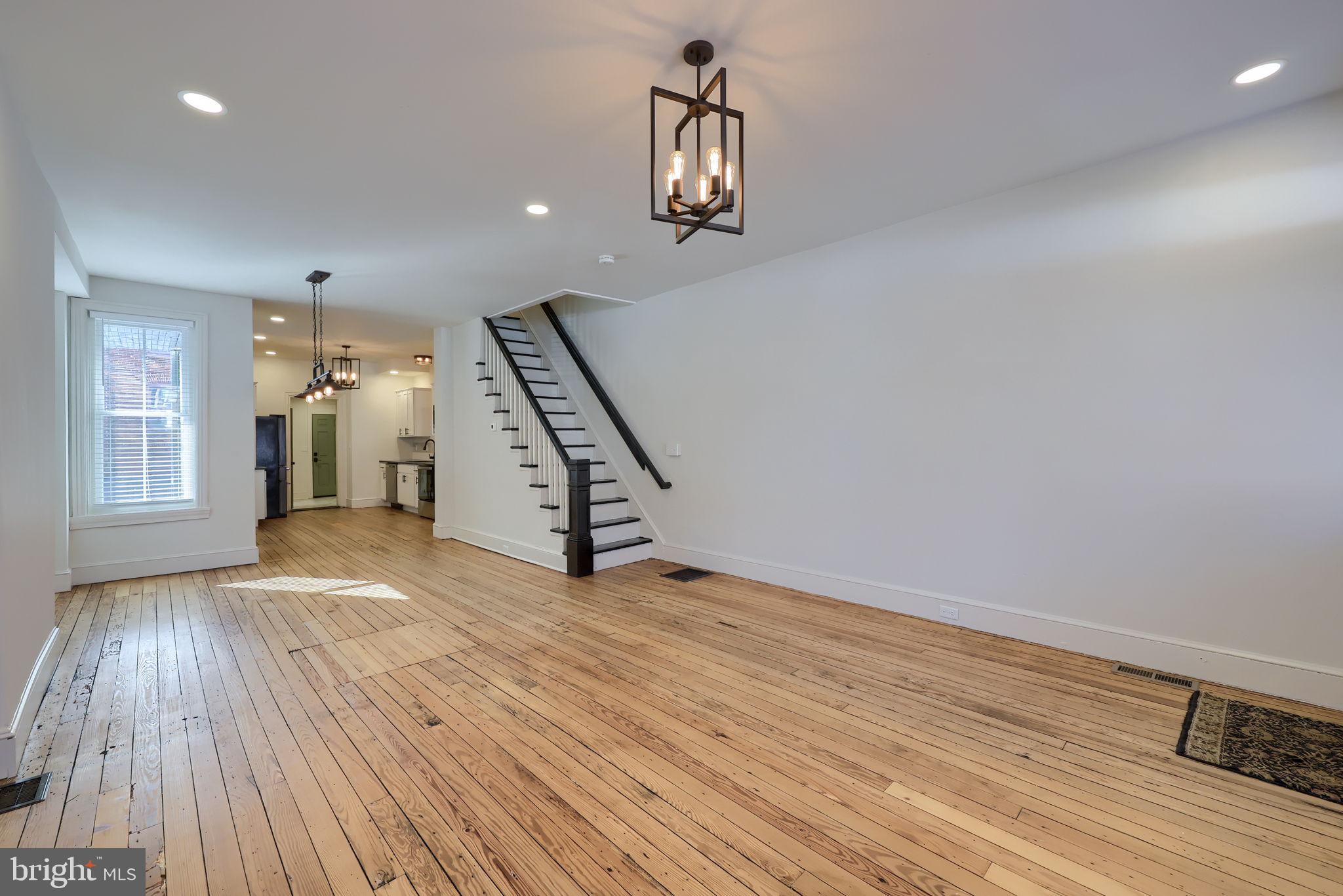 134 South 2nd Street Columbia, PA 17512 - Photo 10 of 47 wooden floor in an empty room with a window