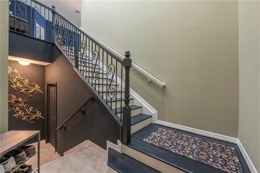 16550 Goldenrod Lane, Unit 201 Fort Myers, FL 33905 - Photo 12 of 45 a view of entryway with wooden floor
