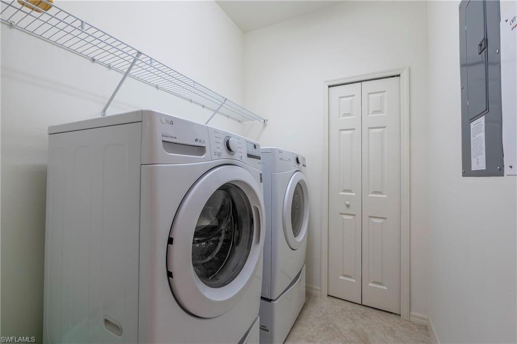 16550 Goldenrod Lane, Unit 201 Fort Myers, FL 33905 - Photo 25 of 45 a utility room with dryer and washer