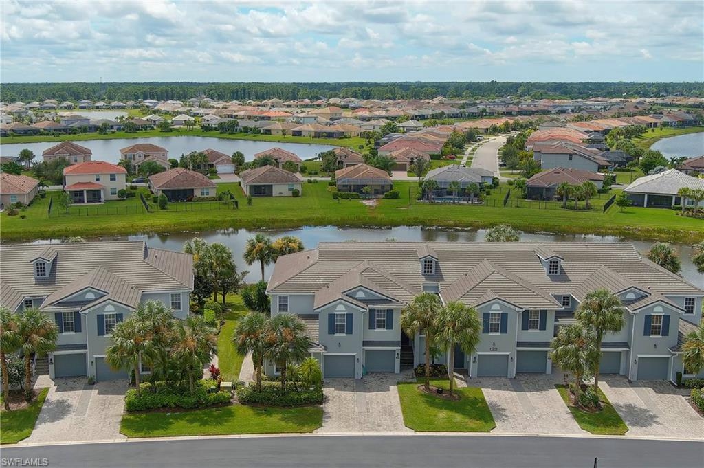 16550 Goldenrod Lane, Unit 201 Fort Myers, FL 33905 - Photo 3 of 45 an aerial view of multiple house