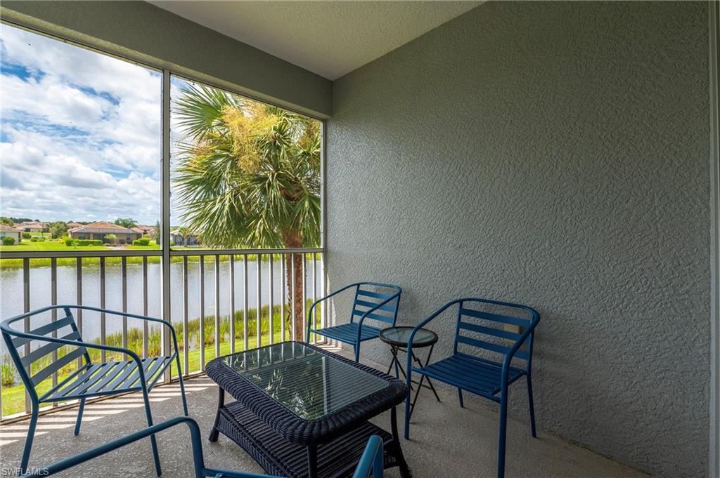 16550 Goldenrod Lane, Unit 201 Fort Myers, FL 33905 - Photo 34 of 45 a view of a chairs in balcony