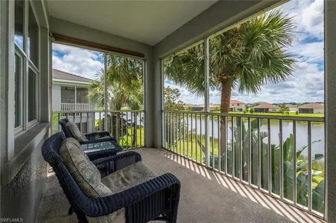 a balcony with furniture