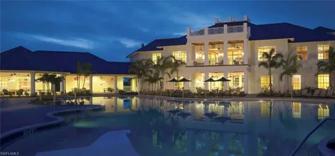 a view of a building with sitting area