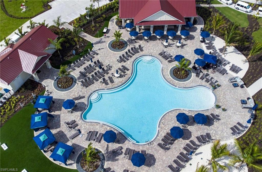 16550 Goldenrod Lane, Unit 201 Fort Myers, FL 33905 - Photo 41 of 45 an aerial view of a swimming pool patio and outdoor seating