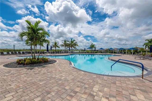 a view of swimming pool with a yard