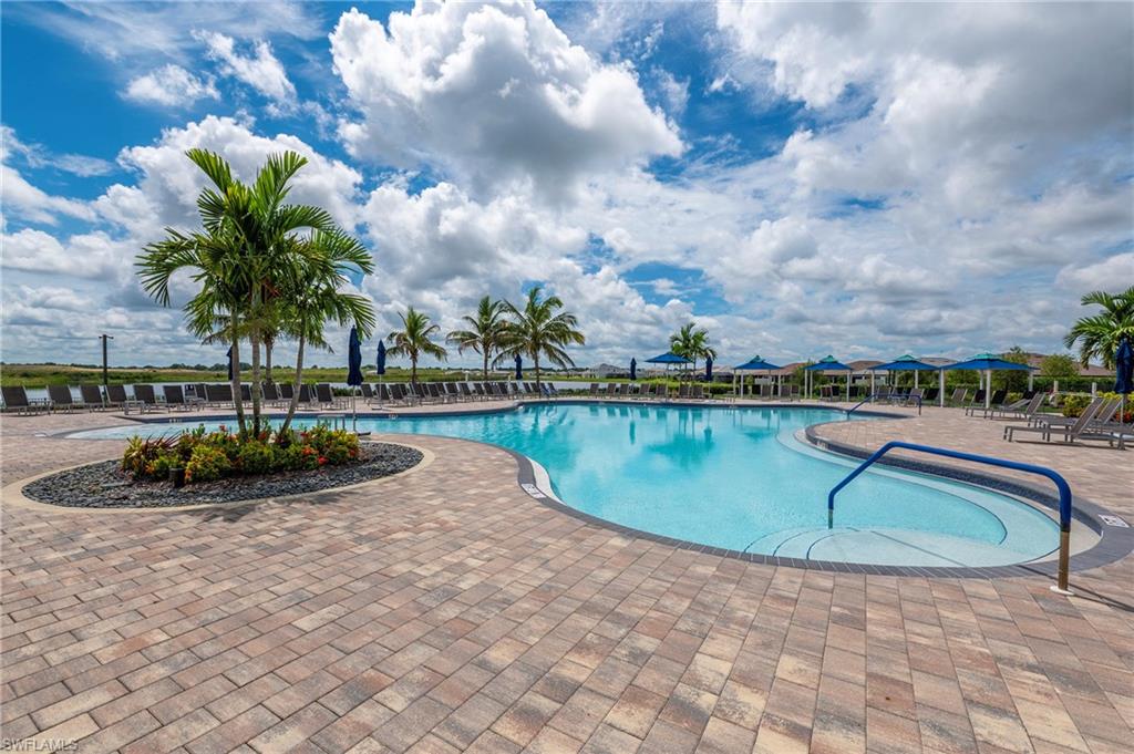 16550 Goldenrod Lane, Unit 201 Fort Myers, FL 33905 - Photo 44 of 45 a view of swimming pool with a yard