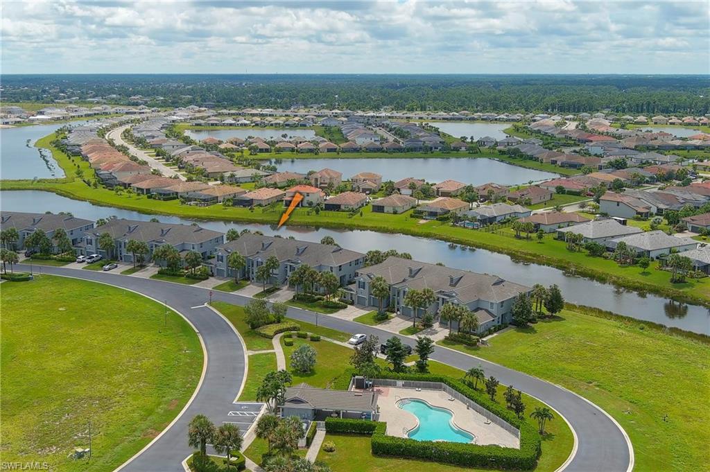16550 Goldenrod Lane, Unit 201 Fort Myers, FL 33905 - Photo 5 of 45 an aerial view of a residential houses with outdoor space