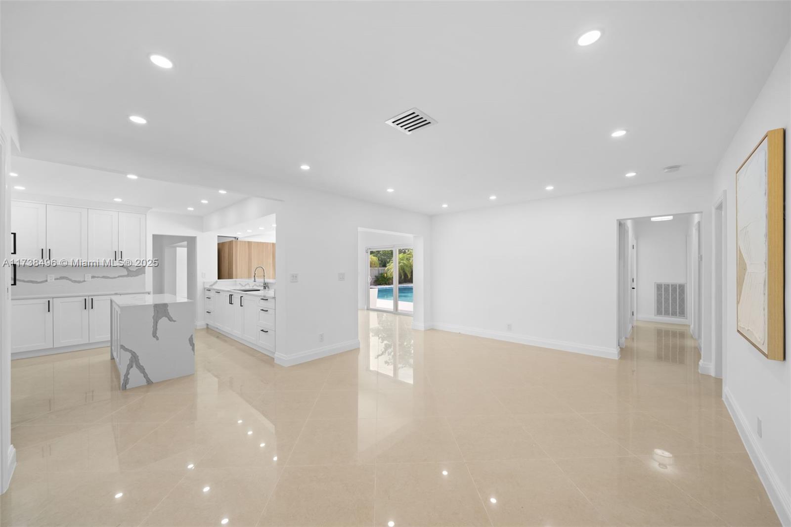 1144 Adams Street Hollywood, FL 33019 - Photo 11 of 51 a view of kitchen with furniture and refrigerator