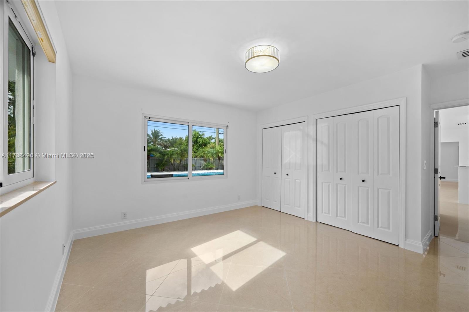 1144 Adams Street Hollywood, FL 33019 - Photo 43 of 51 a view of an empty room with a window