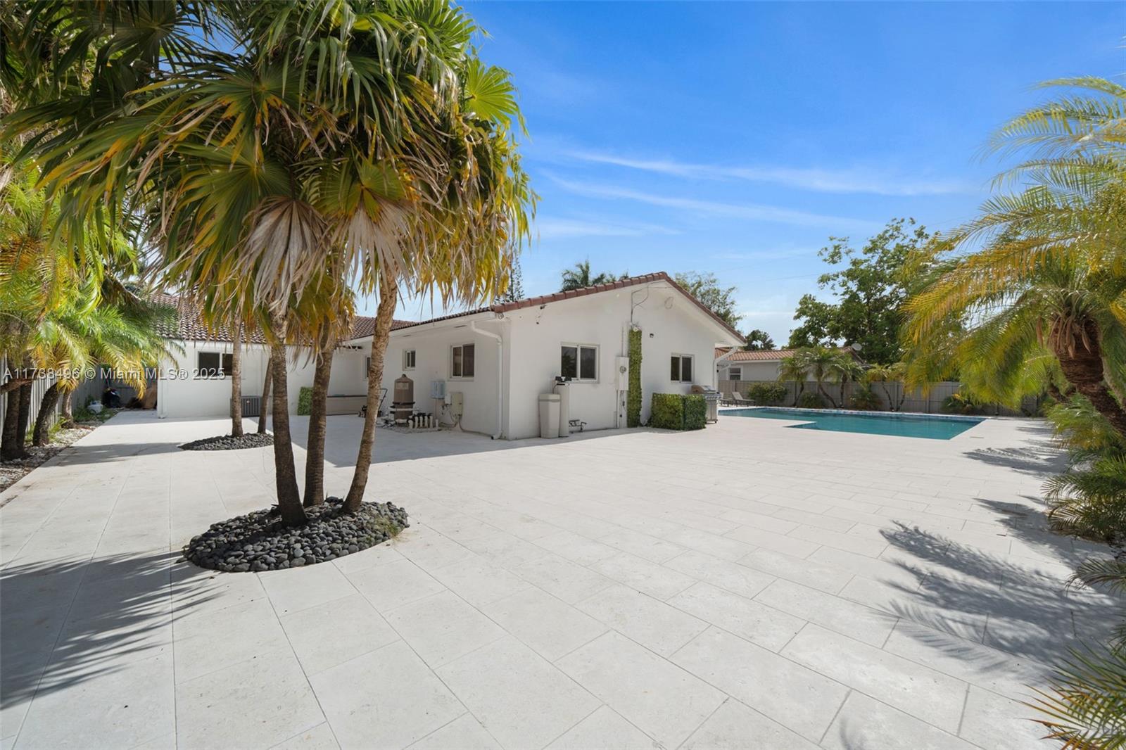 1144 Adams Street Hollywood, FL 33019 - Photo 49 of 51 a street view with a building in the background