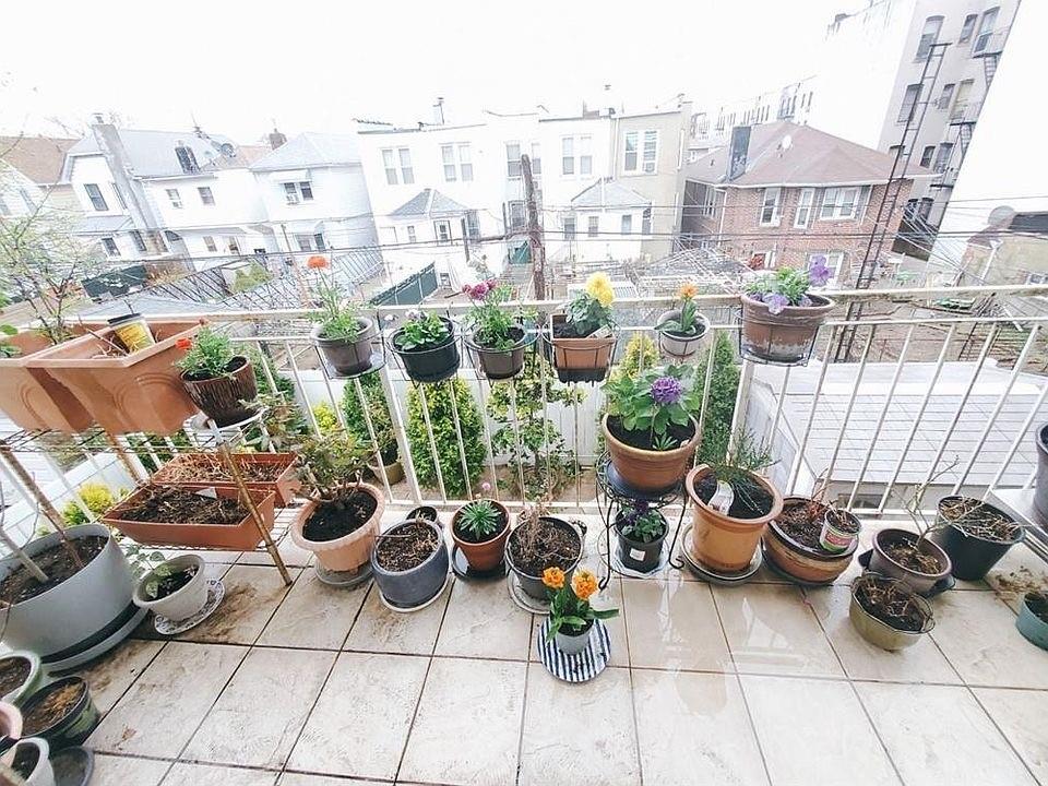 1663 West 6th Street, Unit 3B Brooklyn, NY 11223 - Photo 4 of 16 a view of a chairs and table in a patio