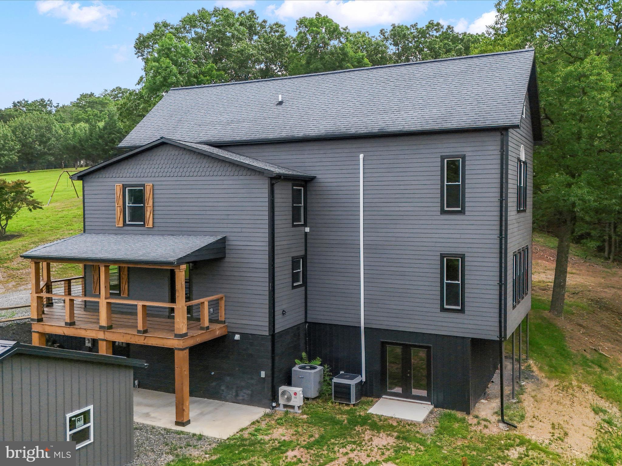 783 Community Way Road Romney, WV 26757 - Photo 11 of 83 a aerial view of a house with pool table and chairs
