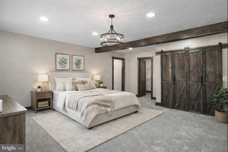 783 Community Way Road Romney, WV 26757 - Photo 18 of 83 a spacious bedroom with a bed and a chandelier